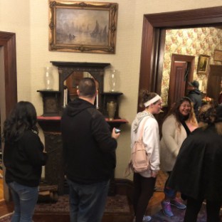 a group of people standing in a room