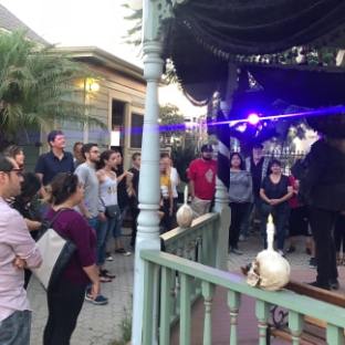 a group of people standing in front of a building