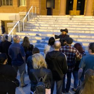 a group of people standing in front of a crowd