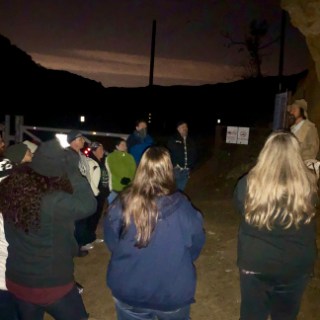 a group of people standing in a room