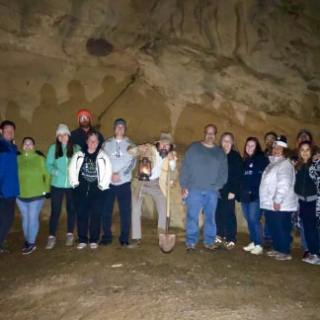 a group of people standing in front of a crowd