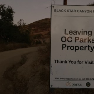 a sign on the side of a road