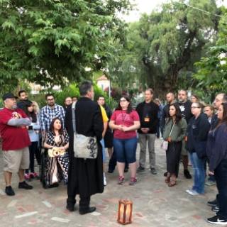 a group of people standing in front of a crowd