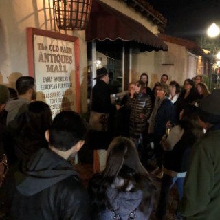 a group of people standing in front of a crowd