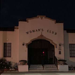 a sign on the side of a building