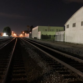 a large long train on a steel track