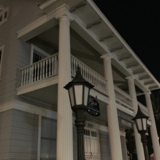 a street sign in front of a building