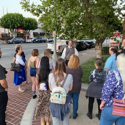 a group of people standing in front of a crowd