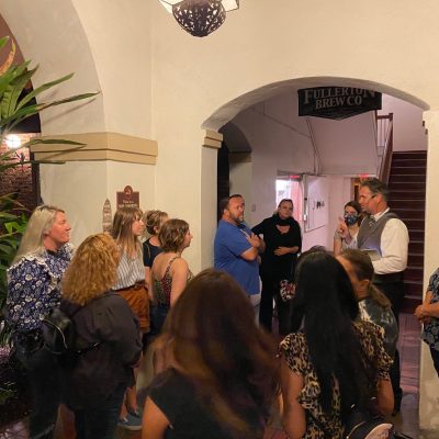 a group of people standing in a room