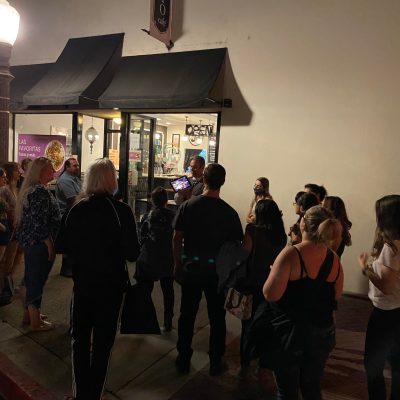 a group of people standing in front of a crowd