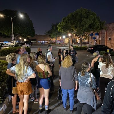a group of people standing in front of a crowd