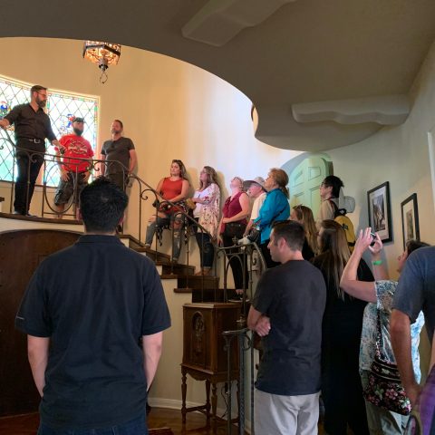 a group of people standing in a room