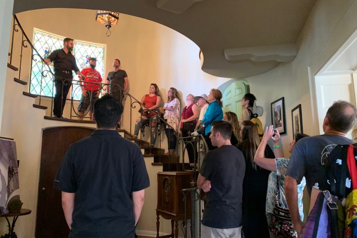 a group of people standing in a room