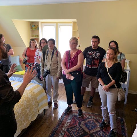 Jens Koeppen et al. standing in a room