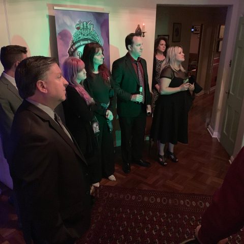 a group of people standing in a room