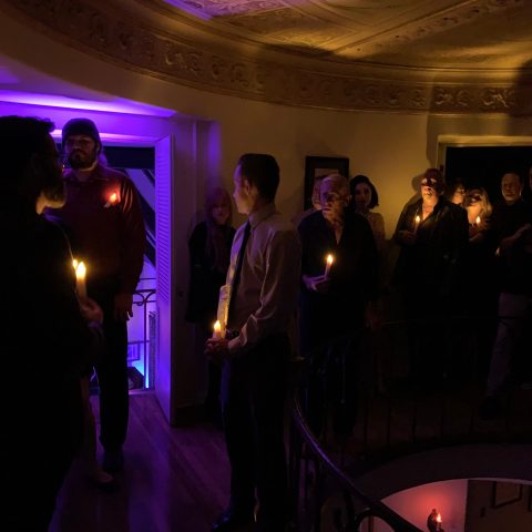 a group of people standing in a room