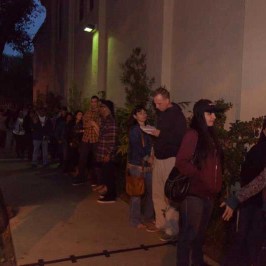 a group of people that are standing in the street