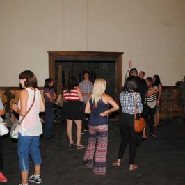 a group of people standing in a room