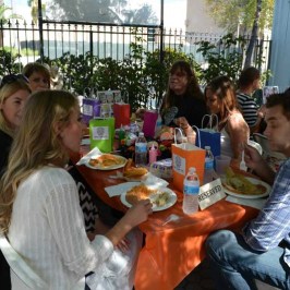 a group of people sitting at a table