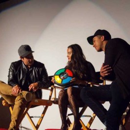 a group of people sitting in a chair