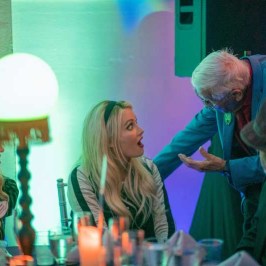 a group of people sitting at a table
