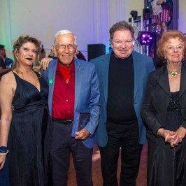 Bob Gurr et al. posing for the camera