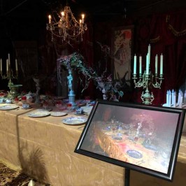a group of people standing in front of a television
