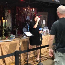 a person standing in front of a table