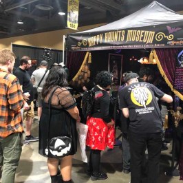 a group of people standing in front of a crowd