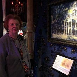 a man standing in front of a building