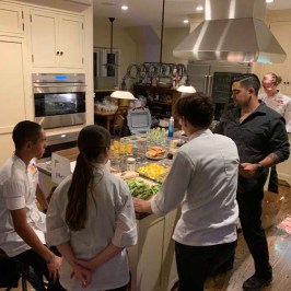 a group of people standing in a room