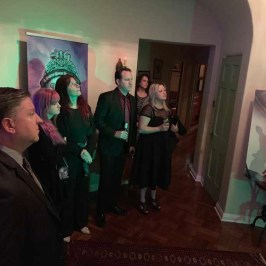 a group of people standing in a room