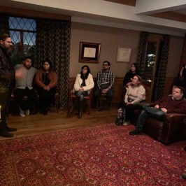 a group of people standing in a room