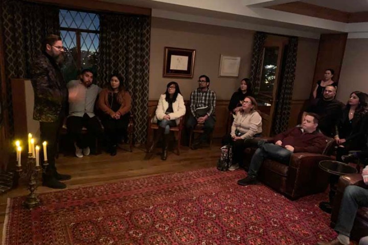 a group of people standing in a room