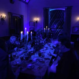 a group of people in a dark room