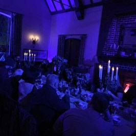 a group of people in a dark room