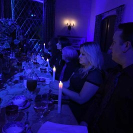 a group of people in a dark room