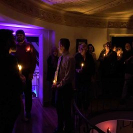 a group of people standing in a room