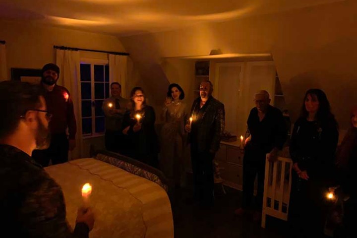 a group of people standing in a room