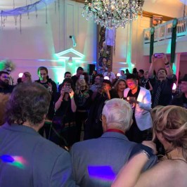 a group of people in front of a crowd