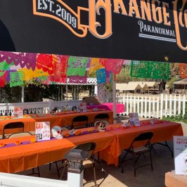 a stack of flyers on a table