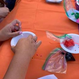 a woman sitting on a table