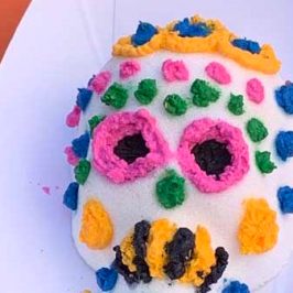 a teddy bear with a birthday cake