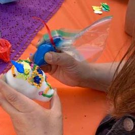 a woman sitting on a table