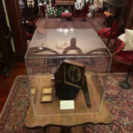 a living room filled with furniture and a rug