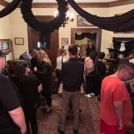 a group of people standing in a room