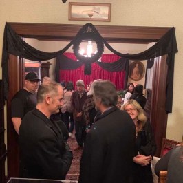 a group of people standing in front of a crowd