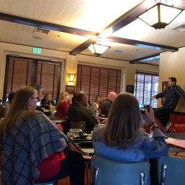 a group of people standing in a room