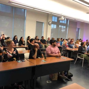 a group of people sitting at a table