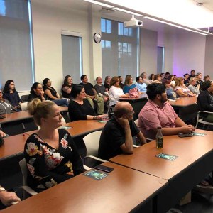 a group of people sitting at a table